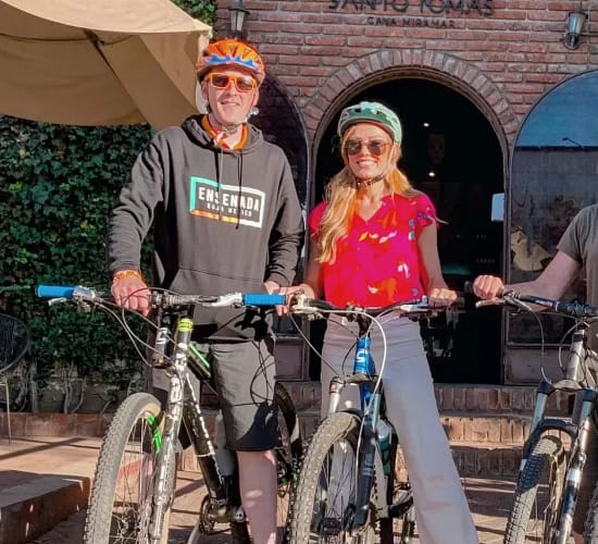 four cyclists in front of an historical winery in Ensenada
