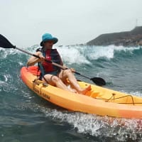 a man on a kayak